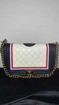 Pre-owned Chanel leather quilted crest medium boy bag